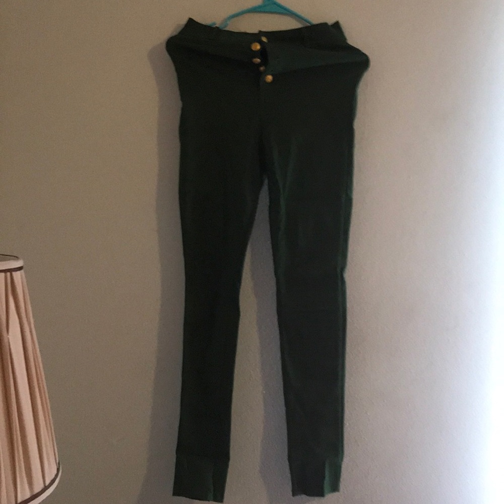 Green, skinny fit jeans.